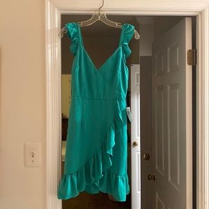 New with tags. B. Darlin ruffle wrap minidress size 7-8 kelly green